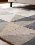 Trendy Classic Multicolor Hand Tufted Wool Rug in a bedroom