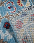 Turquoise Oushak rug back and fringe detail
