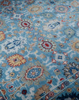 Turquoise Oushak rug allover floral field detail