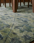 Unique Cozy Green Hand Knotted Wool Rug in a dining room