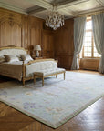 Vintage Aubusson flat weave rug styled in a bedroom