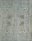 Captivating Traditional Beige Hand Knotted Wool Rug, features intricate patterns in warm beige tones, showcasing its hand-knotted construction.