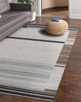 Classic Reversible Delicate Brown Flatweave Wool & Viscose Rug, its subtle brown tones and flatweave construction adding warmth and texture to a well-lit living space with a light wood floor.