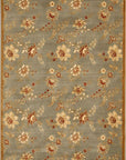 Amara Elegant Blue Machine Made Wool Rug styled in a modern living room - area rug lifestyle photo