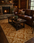 Rustic Bespoke Brown Hand Knotted Afghan Wool Rug styled in a warm traditional living room with stone fireplace and leather sofa - area rug lifestyle photo