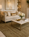Para Bianca Gold Hand Knotted Afghan Wool Rug styled in an elegant living room with champagne sofa and brass accents - area rug lifestyle photo
