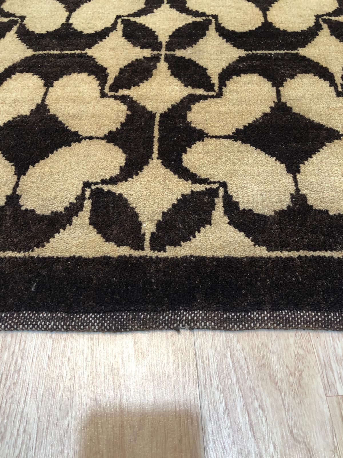 Dazzling Delicate Black Hand Knotted Wool Rug