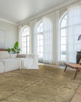 Para Bespoke Beige Hand Knotted Wool Rug, a creamy, subtly patterned textile anchoring a modern living space with neutral tones and natural light, showcasing its plush hand-knotted construction.