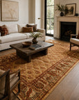 Giselle Zinnia Brown Hand Knotted Wool Rug styled in a modern living room - area rug lifestyle photo