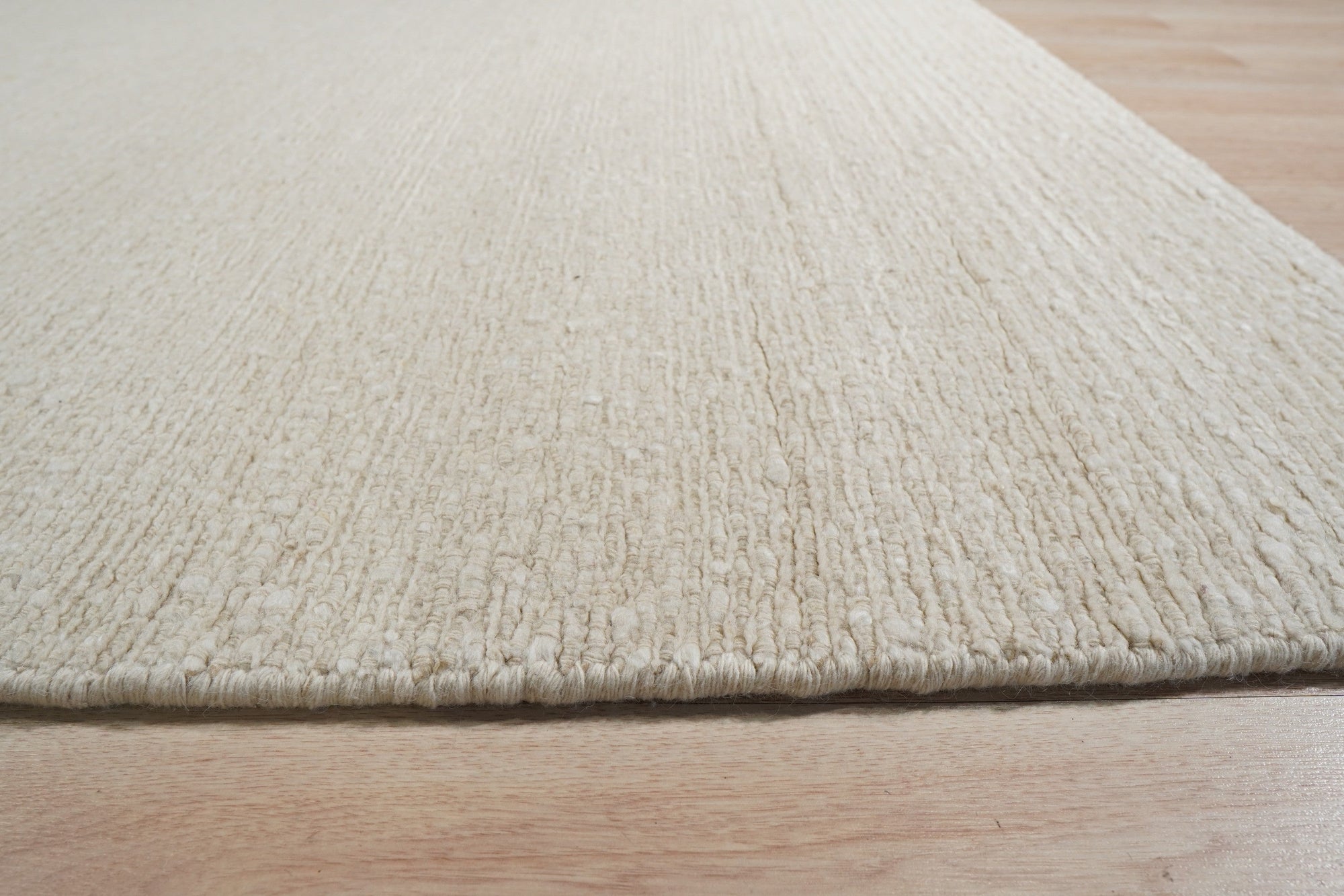 Minimalist Ivory Wool Rug