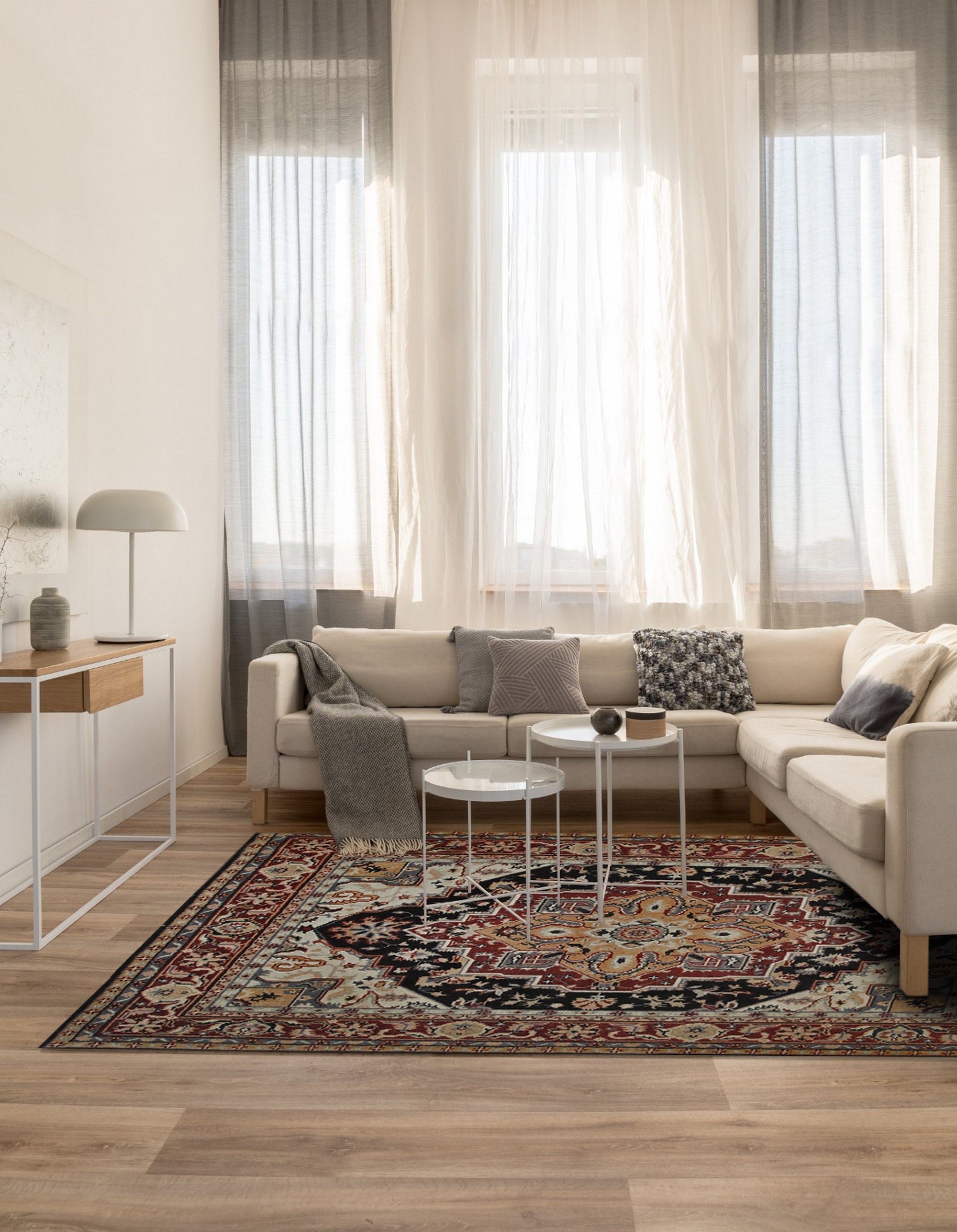 Ella Oriental Navy Hand Knotted Wool Rug, a navy wool rug with a traditional oriental design, seen in a styled living room setting.