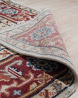 Sophisticated Radiant Ivory Hand Knotted Wool Rug gracing a minimally decorated room; its creamy ivory wool pile and subtle hand-knotted texture soften the modern space.