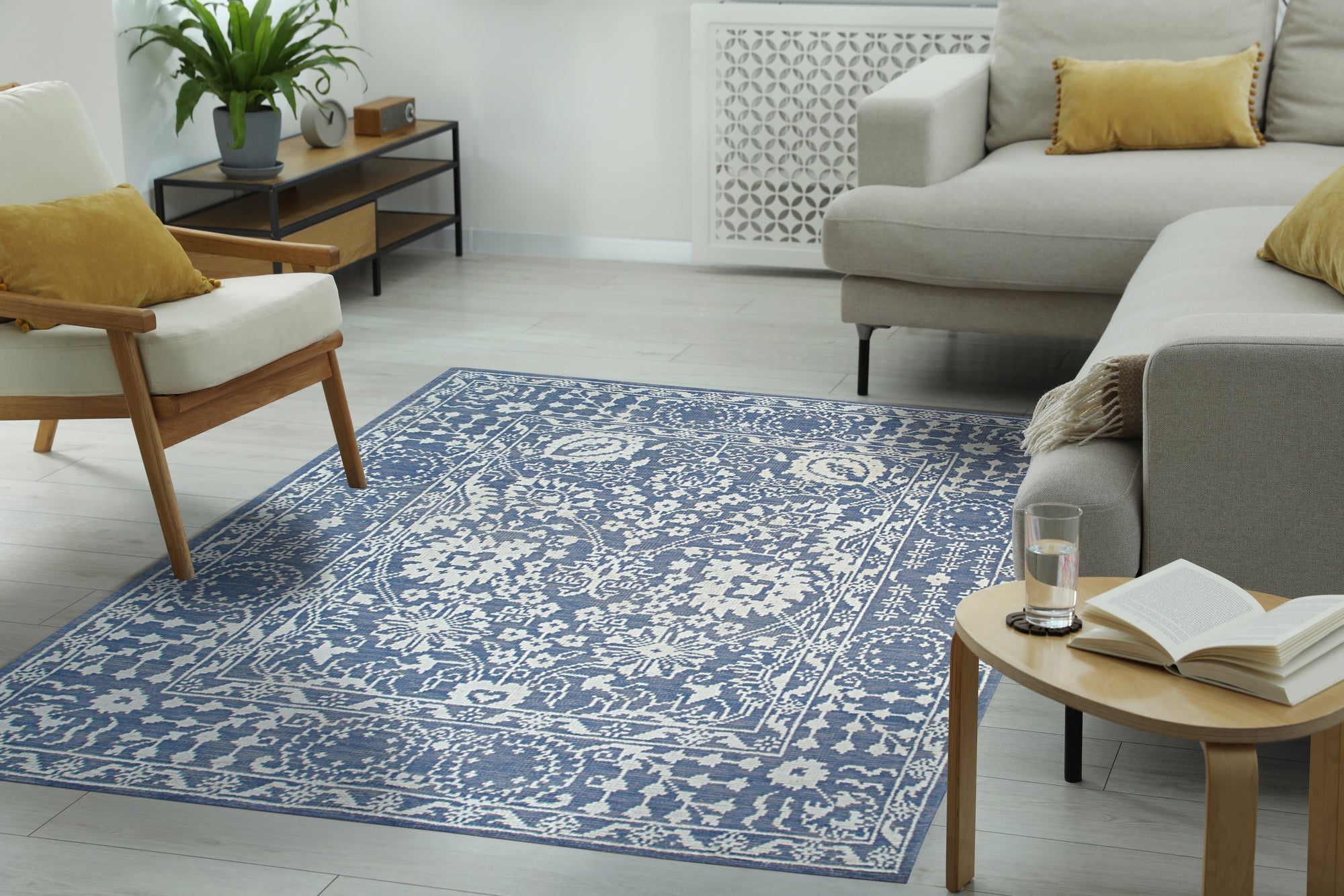 Ava Agra Blue Hand Knotted Wool &amp; Bamboo Silk Rug, soft blues and intricate patterns dance across a floor covering blending the durability of wool with the shimmering elegance of bamboo silk.