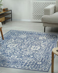 Ava Agra Blue Hand Knotted Wool & Bamboo Silk Rug, soft blues and intricate patterns dance across a floor covering blending the durability of wool with the shimmering elegance of bamboo silk.