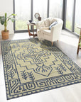 Louie Trara Blue Hand Knotted Wool & Bamboo Silk Rug, its intricate pattern unfurling across the floor in shades of blue.