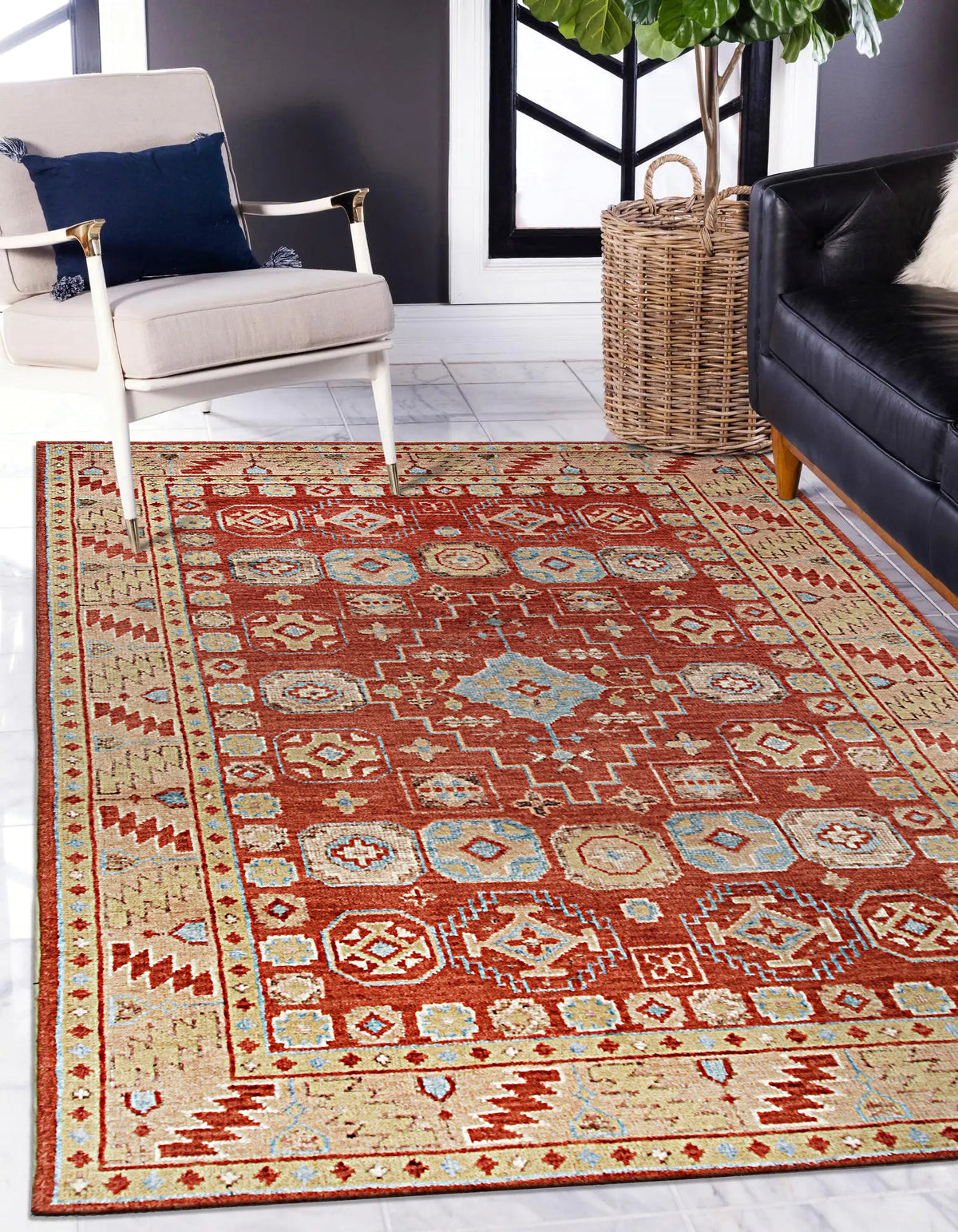 Kira Zinnia Rust Hand Knotted Wool Rug, its rich crimson tones and intricate hand-knotted wool construction bring warmth and texture to a stylish living room setting.