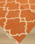 Opulent Delicate Orange Hand Knotted Rug, showcasing vibrant orange hues and intricate hand-knotted details. Soft, luxurious texture complements the delicate design, lending warmth and sophistication to its setting.