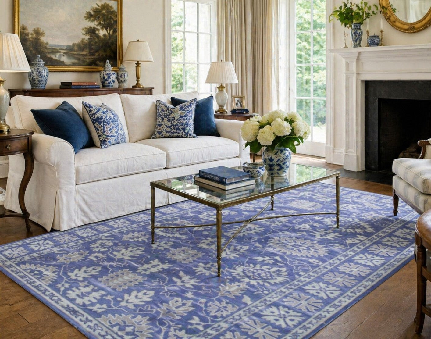 Rustic Oriental Blue Hand Tufted Wool Rug styled in an elegant traditional living room with white sofa and navy blue accents - area rug lifestyle photo