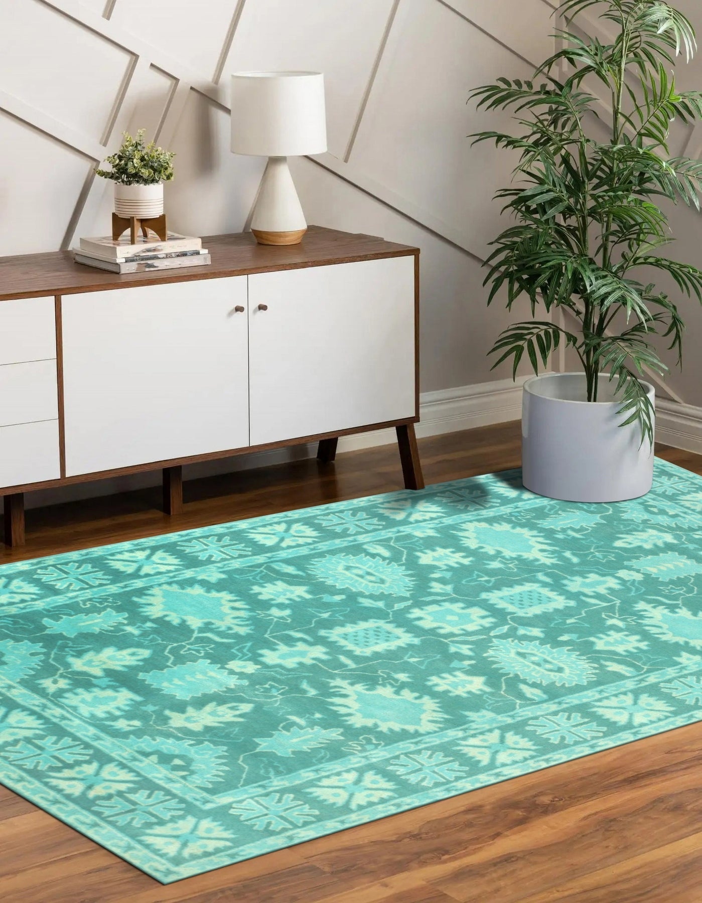 Louie Oriental Turquoise Hand Tufted Wool Rug, vibrant turquoise wool rug with an intricate oriental design, nestled in a cozy living room setting.