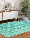 Louie Oriental Turquoise Hand Tufted Wool Rug, vibrant turquoise wool rug with an intricate oriental design, nestled in a cozy living room setting.