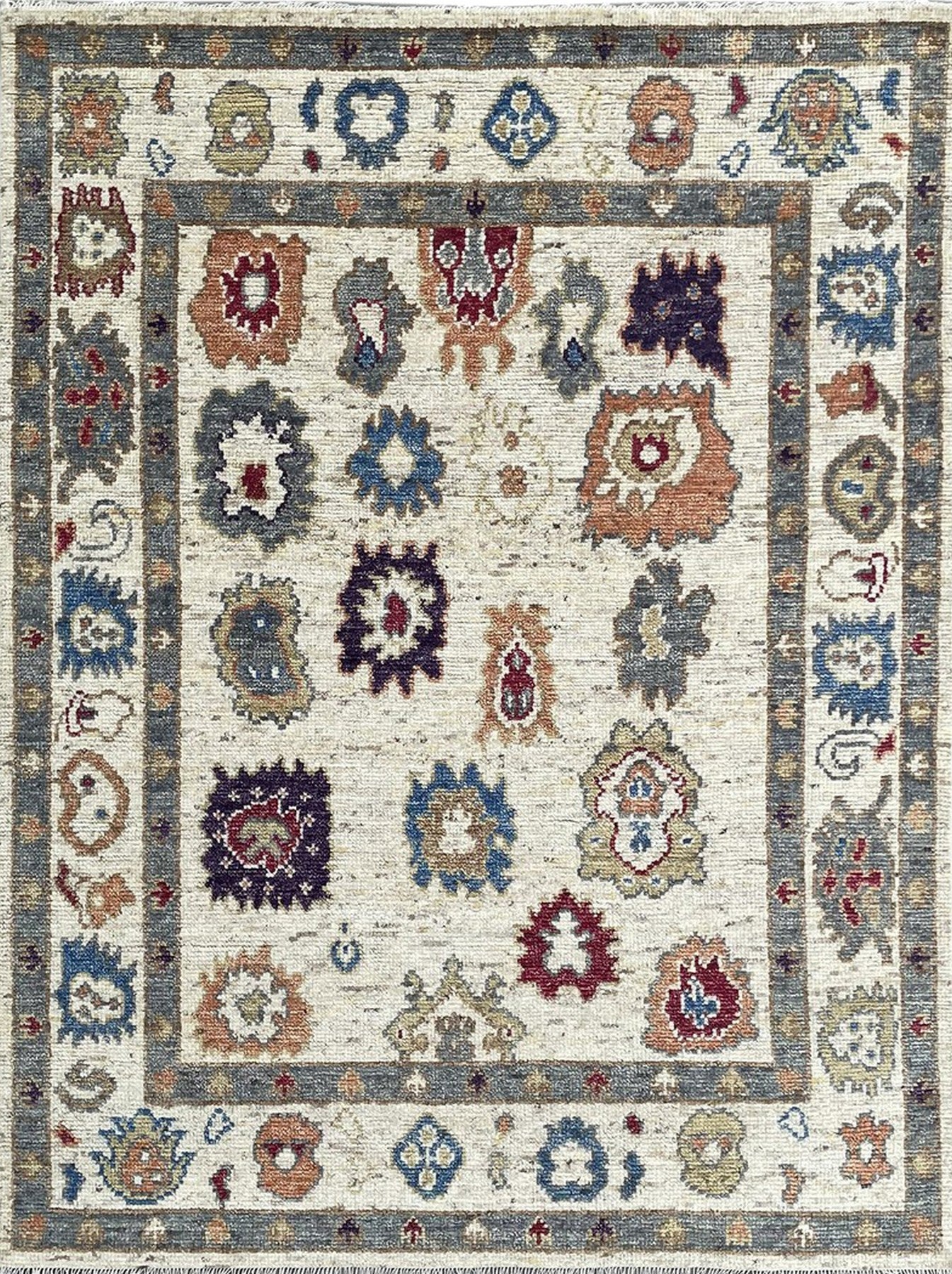 Isolated view of Sumptuous Fiona Ivory Hand Knotted Wool Rug, showcasing its intricate, subtly textured design.