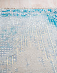 Stylish Sumptuous Aqua Hand Knotted Wool Rug, its cool aqua hues and intricate hand-knotted texture adding a touch of elegance and comfort to a modern living space.