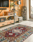 Sophie Chic Red Hand Knotted Wool Rug, vibrant crimson hues and intricate, hand-knotted wool detailing, showcased in a room setting with coordinating furniture.