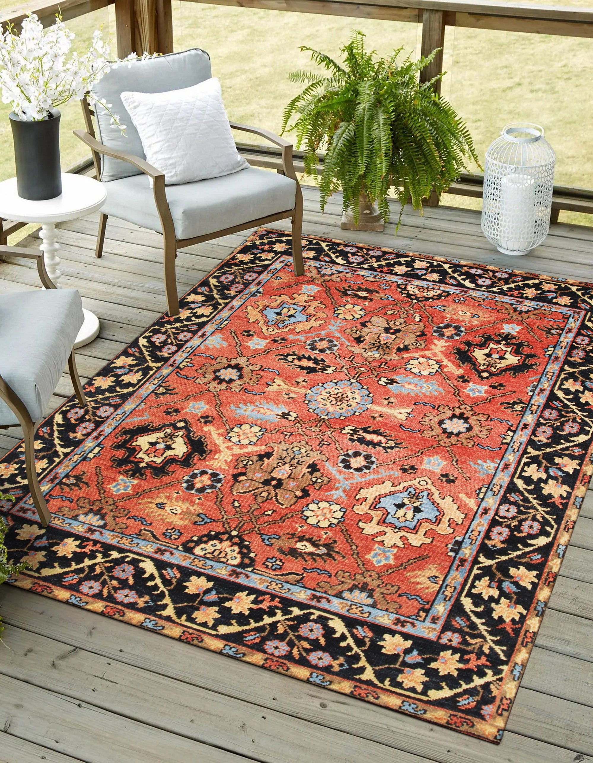 Elegant Traditional Rust Hand Knotted Wool Rug, displaying intricate floral motifs and geometric borders in warm rust tones, lies flat on a light surface, highlighting its handcrafted construction and rich color palette.