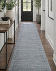 Jasmine Alluring Gray Handmade Wool Rug styled in a modern living room - area rug lifestyle photo