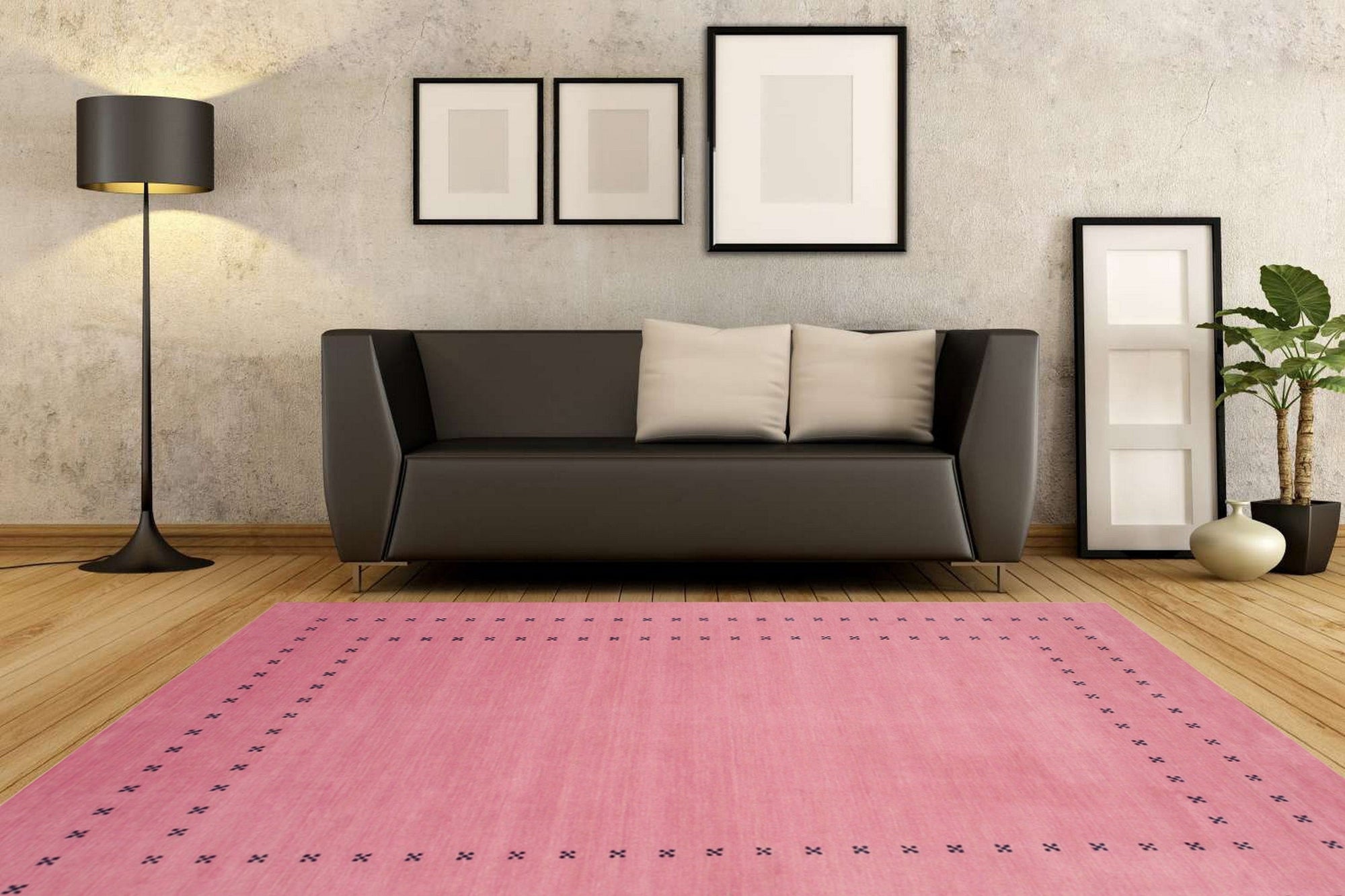 Jasmine Alluring Pink Handmade Wool Rug gracing a contemporary living room; soft pink hues and wool texture complement the modern furniture and neutral walls, creating a warm, inviting space.