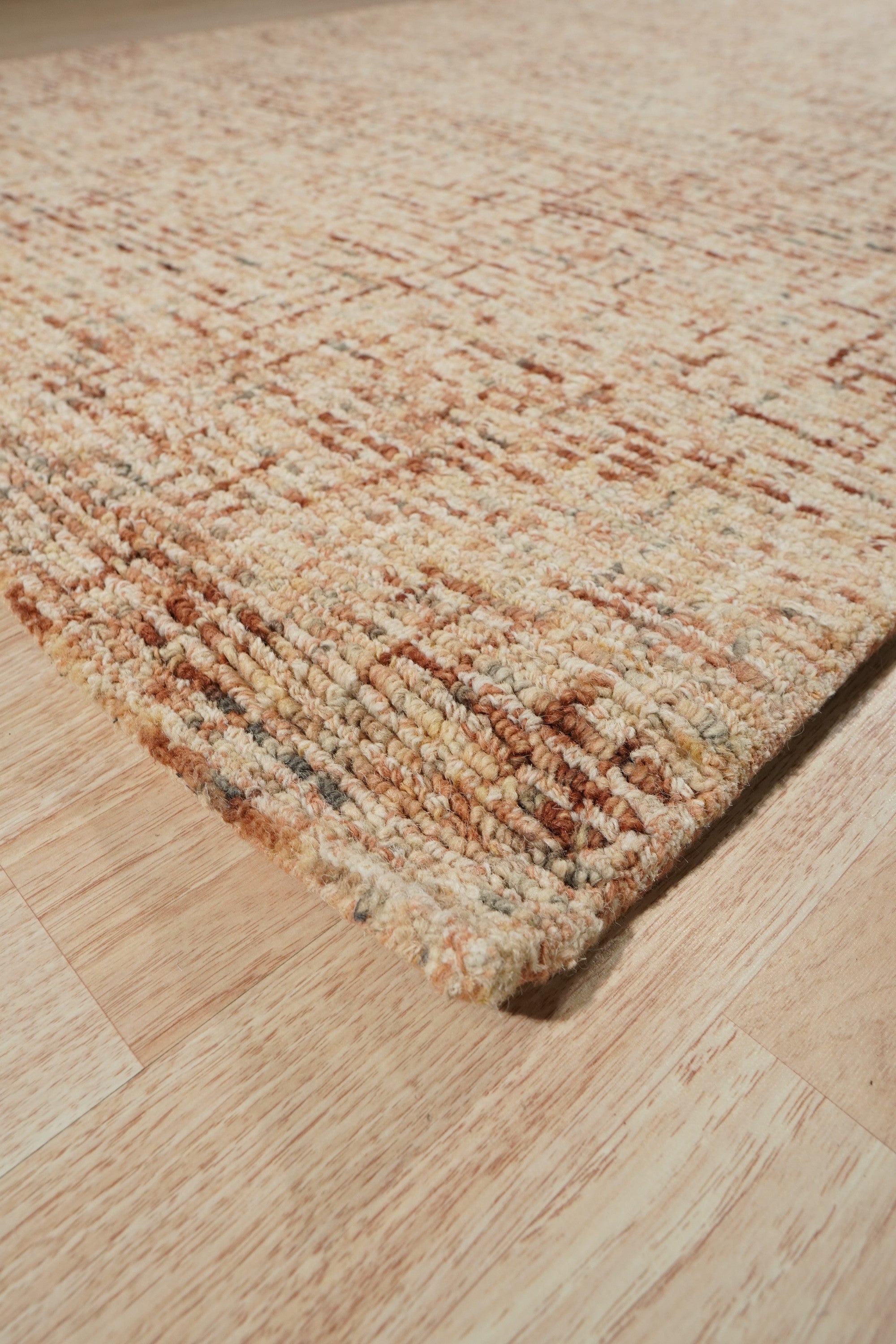 Laine Inviting Brown Hand Tufted Wool Rug, inviting warmth to a sunlit living space. Hand-tufted construction showcases the rug&#39;s texture and subtle brown hues, grounding the room&#39;s decor.