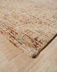 Laine Inviting Brown Hand Tufted Wool Rug, inviting warmth to a sunlit living space. Hand-tufted construction showcases the rug's texture and subtle brown hues, grounding the room's decor.