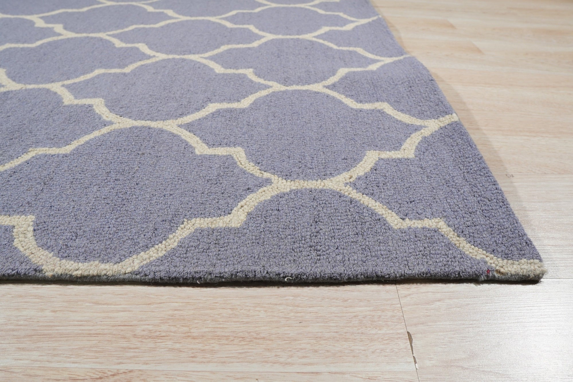 Celia Moroccan Light Purple Hand Tufted Wool Rug, light purple wool rug with a soft, inviting texture, displayed in a bright, airy living space.