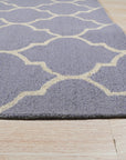 Celia Moroccan Light Purple Hand Tufted Wool Rug, light purple wool rug with a soft, inviting texture, displayed in a bright, airy living space.