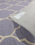 Celia Moroccan Light Purple Hand Tufted Wool Rug, a light purple wool rug with a hand-tufted construction, seen in a well-lit interior space showcasing its texture and subtle Moroccan-inspired pattern.