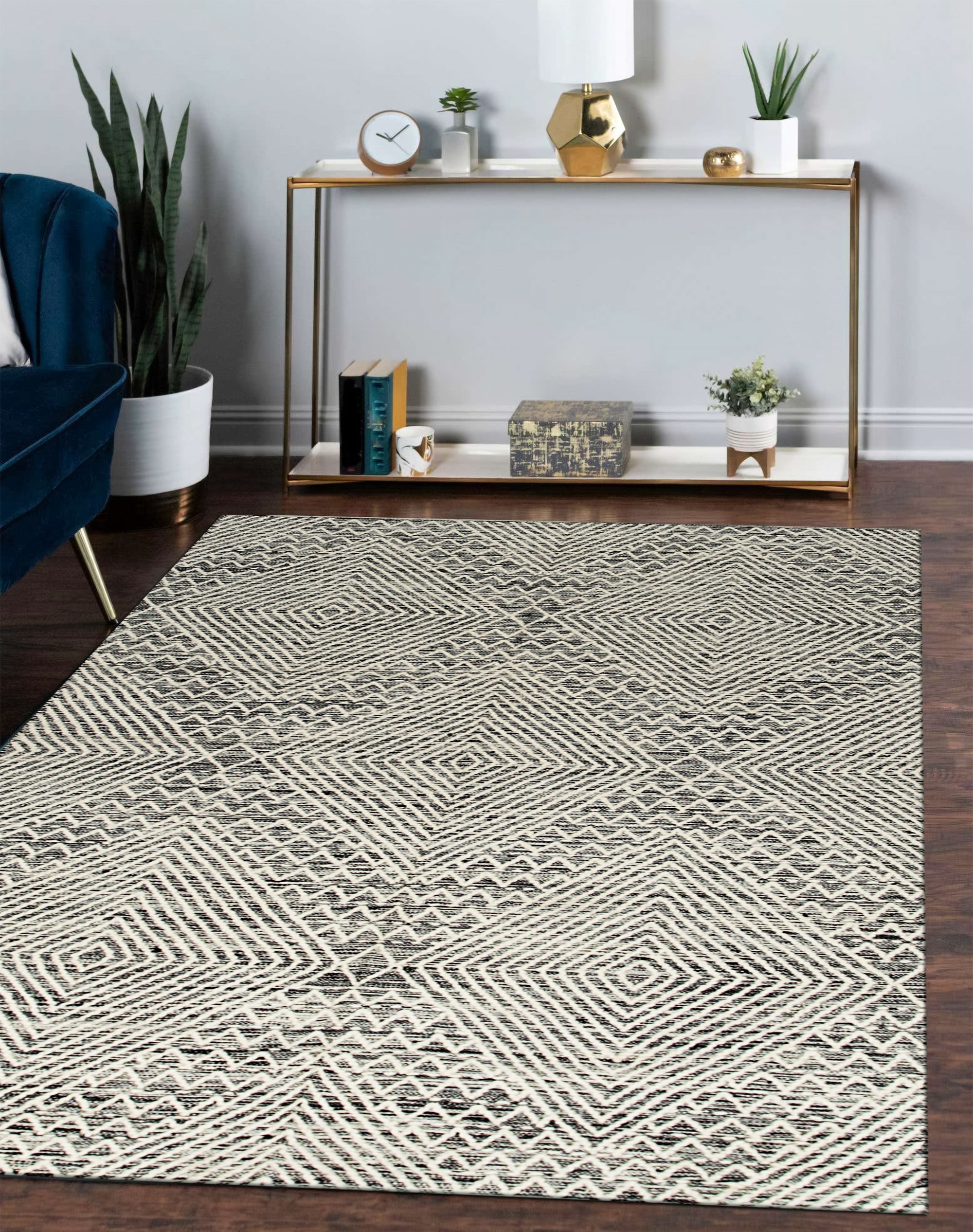 Celia Kilim Blue Handmade Wool Rug, showcasing a vibrant geometric design in shades of blue, cream, and terracotta, handwoven from wool with a flatweave construction, creating a striking focal point.