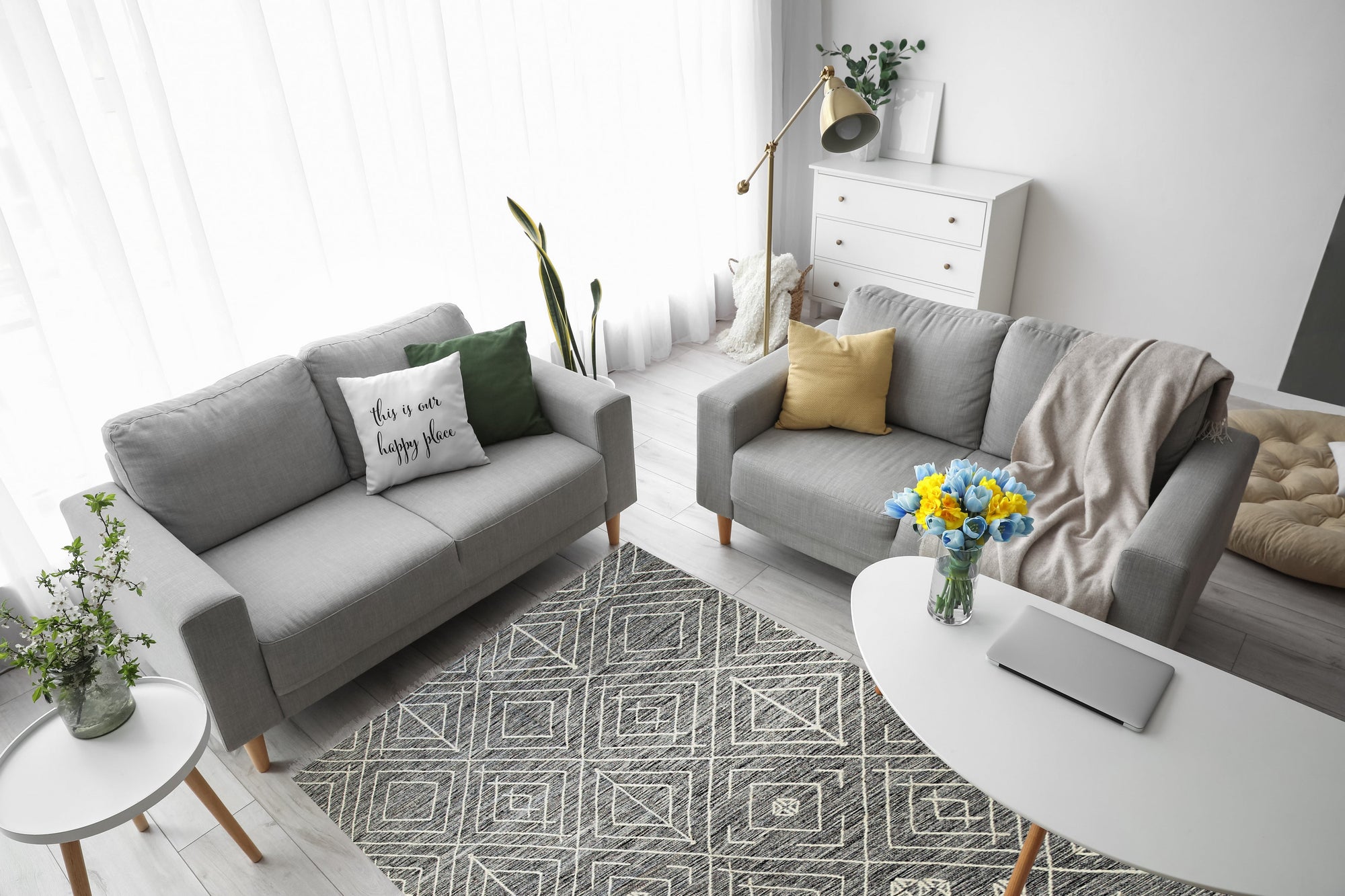 Luxurious Kilim Charcoal Handmade Wool Rug, showcasing its geometric patterns and rich charcoal hues on a living room floor, blending seamlessly with modern furniture.