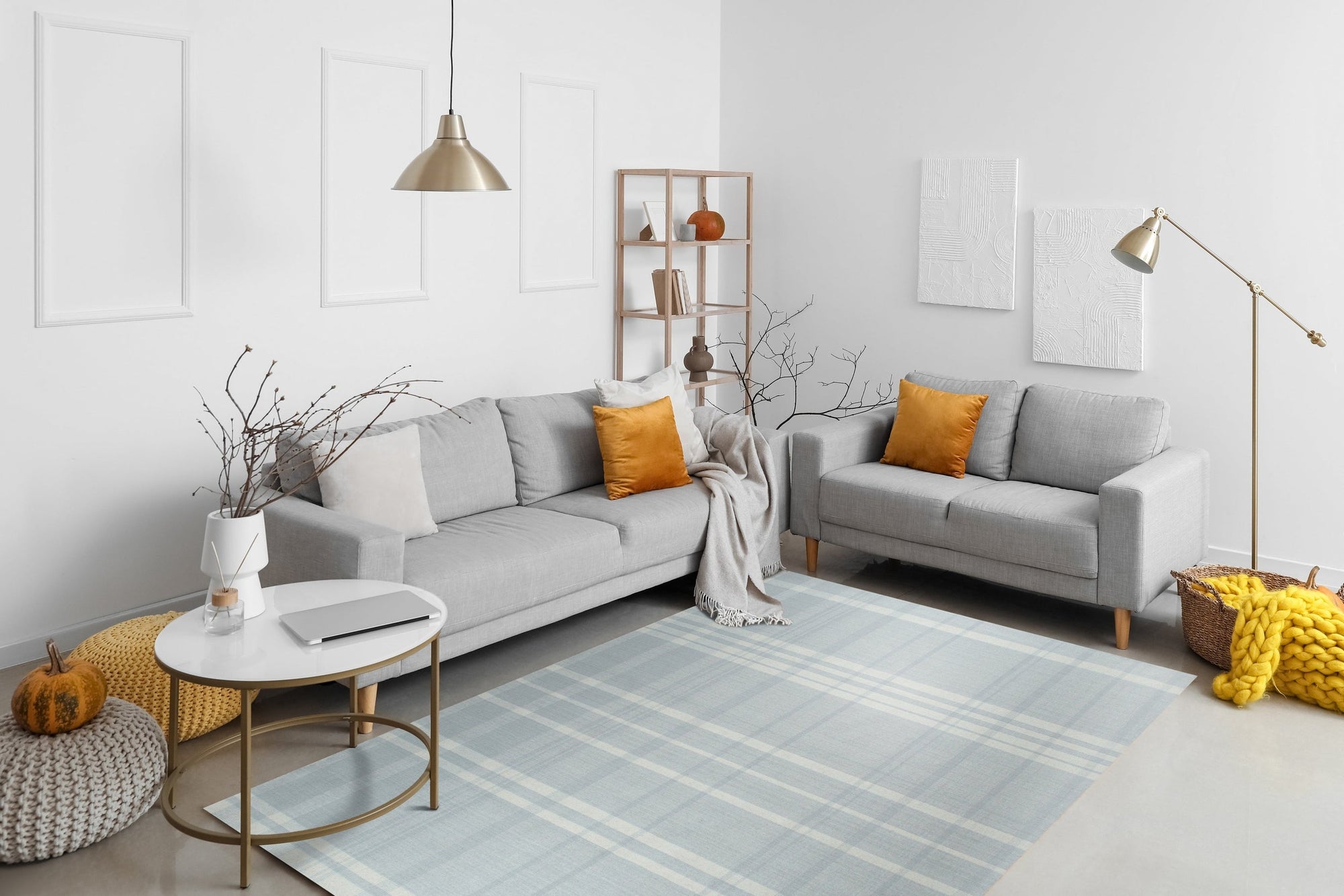 Dazzling Fiona White Flatweave Wool Rug graces a modern living room, its clean lines and subtle texture complementing the light wood floor and minimalist furniture.