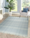 Dazzling Fiona White Flatweave Wool Rug, a bright, minimalist rug in a living room setting, its flatweave construction adding a subtle textural element to the light-filled space.