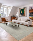 Freya Gabbeh Gray Handmade Wool Rug shown in a styled living room setting