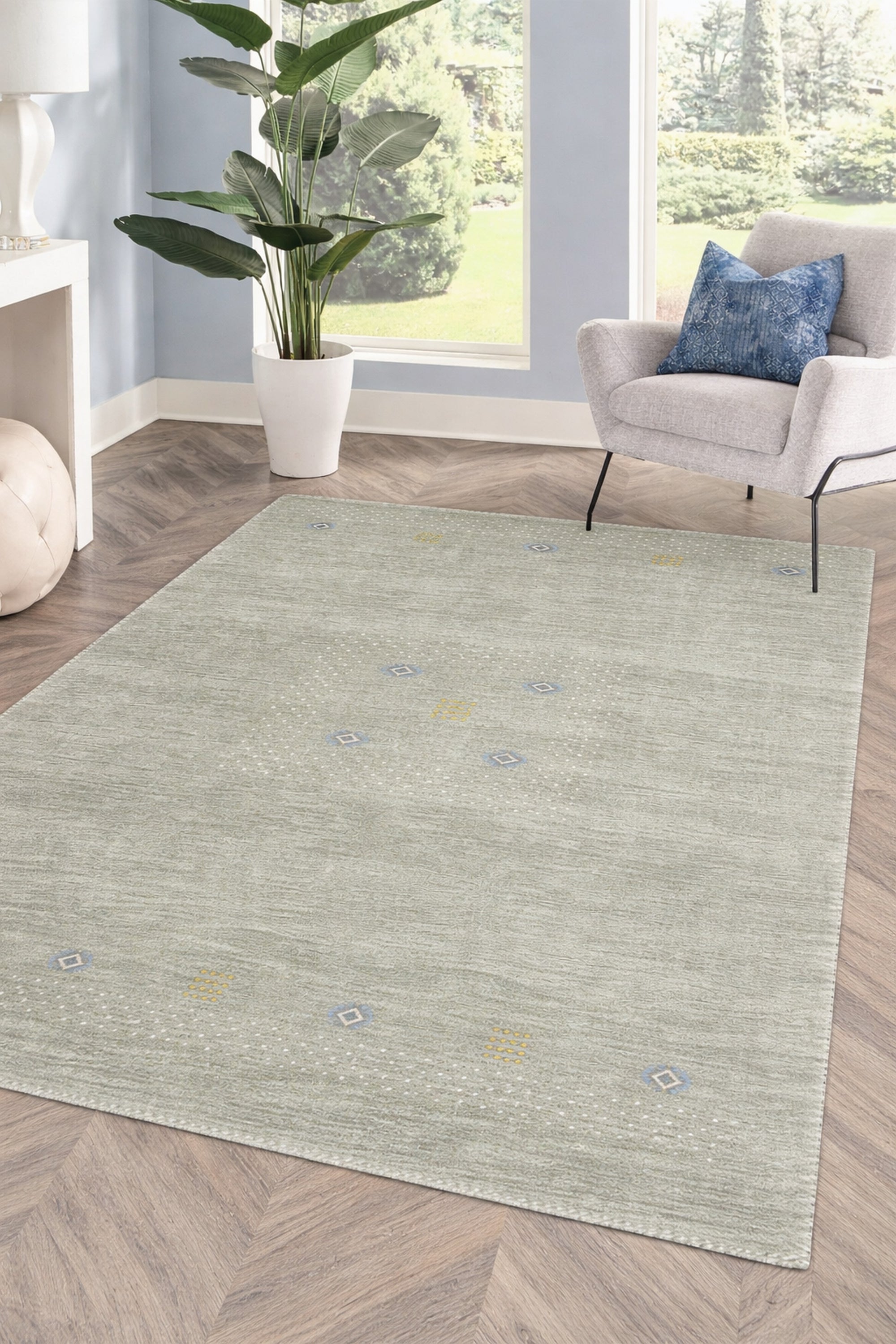 Freya Gabbeh Gray Handmade Wool Rug shown in a styled living room setting