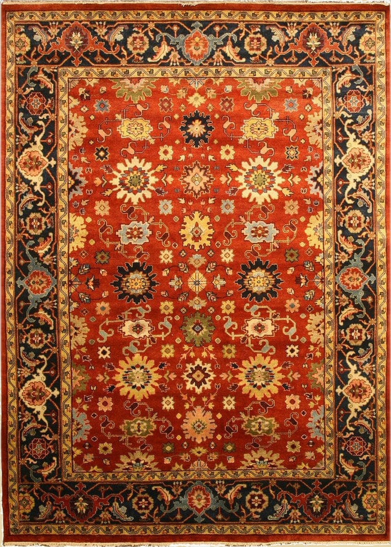 Isolated view: Kira Zinnia Rust Hand Knotted Wool Rug bursts with floral energy, rust and cream blossoms unfurling across a textured wool field.