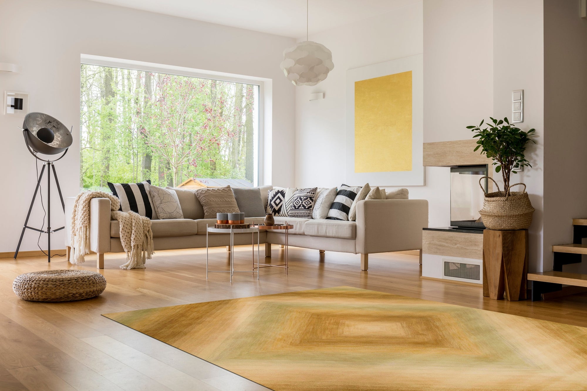 Enchanting Selene Ivory Hand Tufted Wool Rug, seen in a bright, airy living space, features a subtle geometric pattern in soft ivory tones adding warmth and texture to the room.