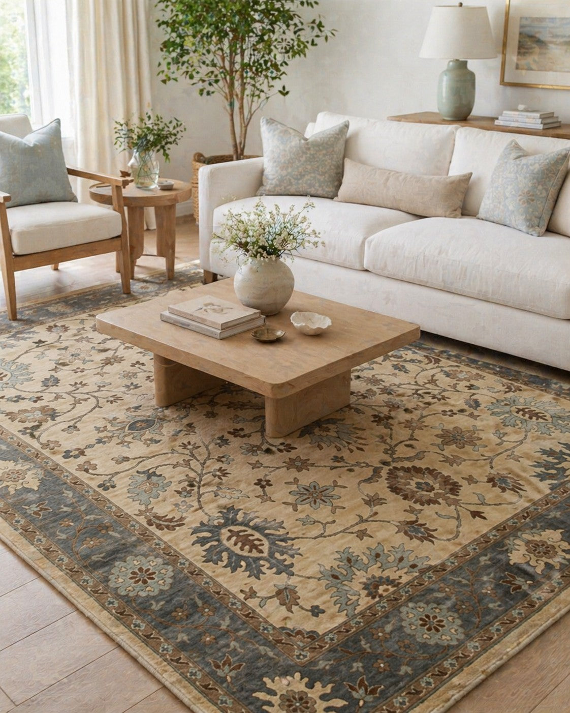 Opulent Oushak Ivory Hand Knotted Wool Rug styled in a serene luxurious living room - area rug lifestyle photo
