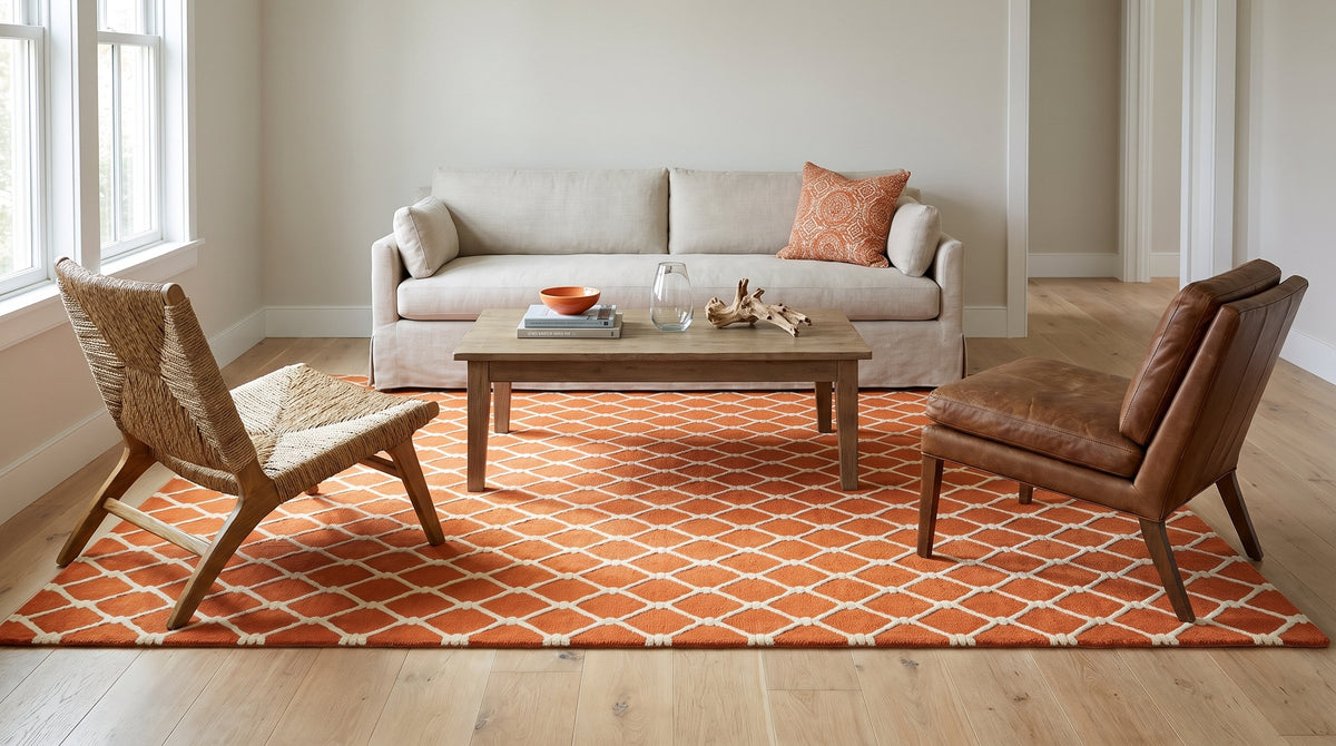 Amara Delicate Orange Hand Tufted Wool Rug in a living room