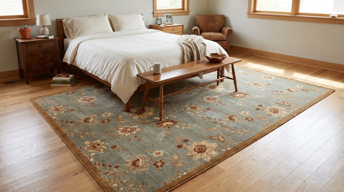 Amara Elegant Gray and Gold Machine Made Wool Rug in a bedroom