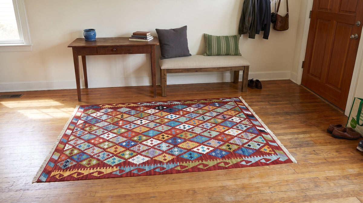 Amara Kilim Multicolor Flatweave Wool Rug in a entryway