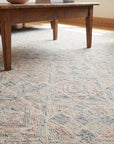 Amara Nina Multicolor Hand Tufted Wool Rug in a living room