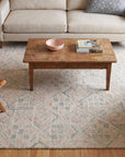 Amara Nina Multicolor Hand Tufted Wool Rug in a living room