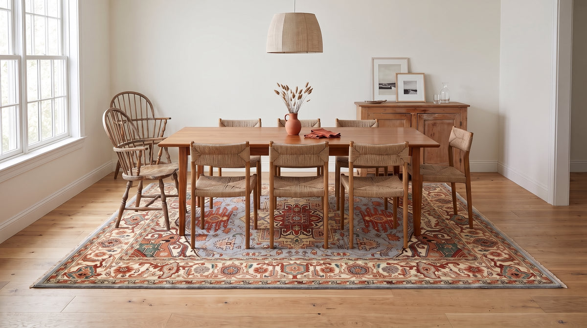 Amara Ruby Blue Hand Knotted Wool Rug in a dining room